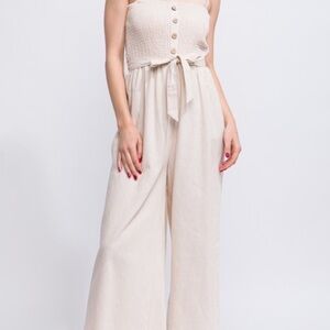 Elegant Wide-Leg Jumpsuit with Button Detail in Off-White